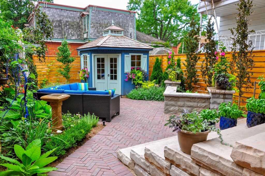 a beautiful green patio with a gazebo